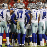 Dallas Cowboys in the Huddle
